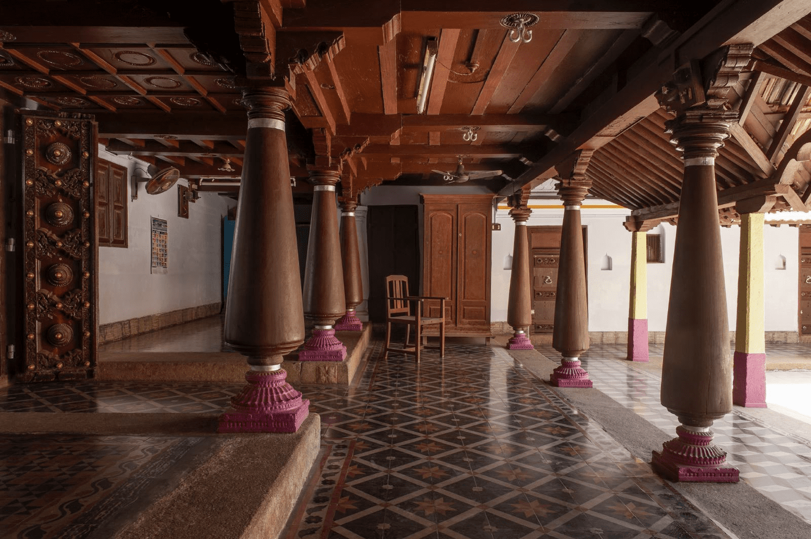 Teak wooden pillars and stone pillars